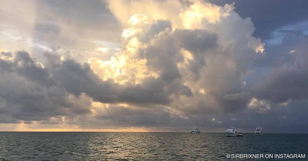 Sun behind clouds over the sea 