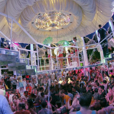 Go go dancers performs while clubbers dance inside Paradis discotheque in San Antonio in the island of ibiza, Spain, june 2013.