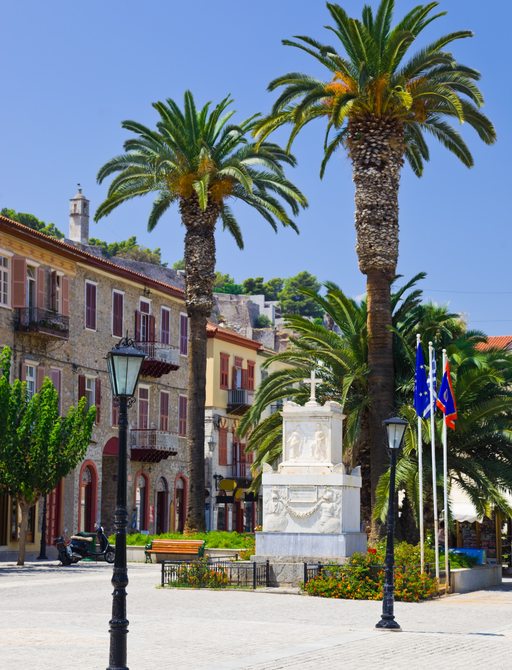 town centre of Nafplio, Greece, lined with palm trees